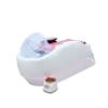 Pura White Pink Head Spa with massage chair and plumbed basin
