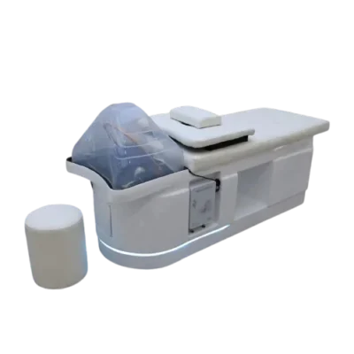 Fujiko Head Spa with white plumbed treatment bed and stool